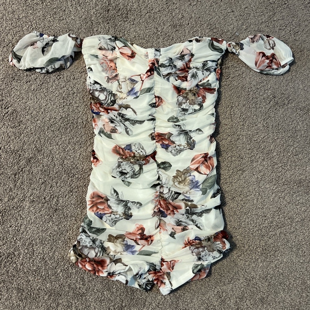 ruched off the shoulder romper with a pretty floral design 🥰